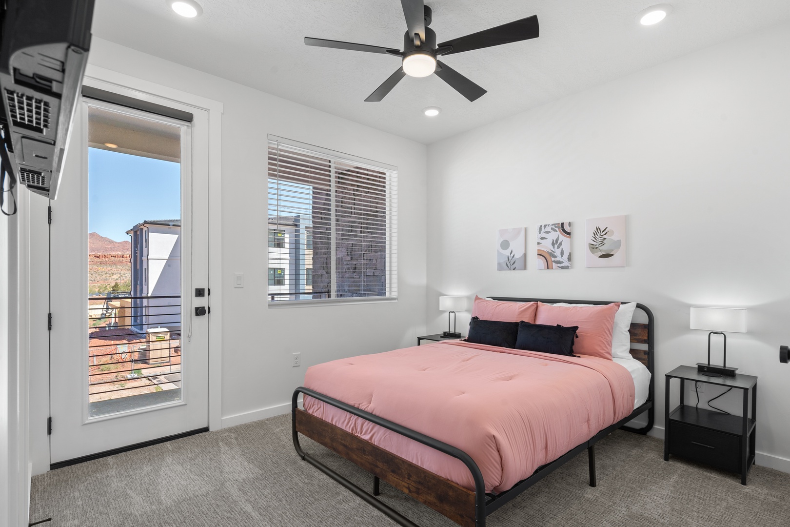 The final balcony suite features a cozy queen-sized bed, ensuite, & smart TV