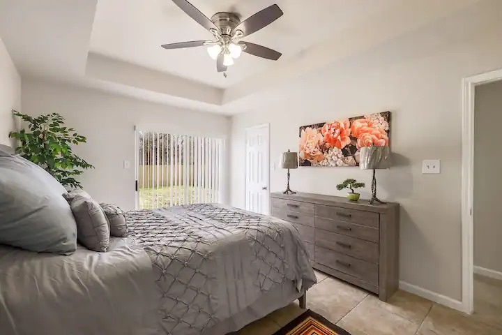 The master bedroom offers a queen bed, private en suite, & Smart TV