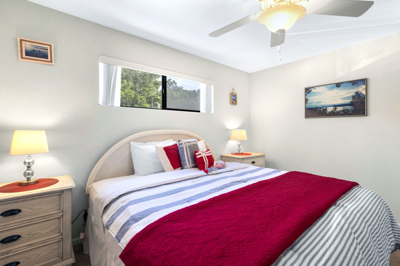 Recharge in the spacious bedroom retreat, boasting a plush king bed