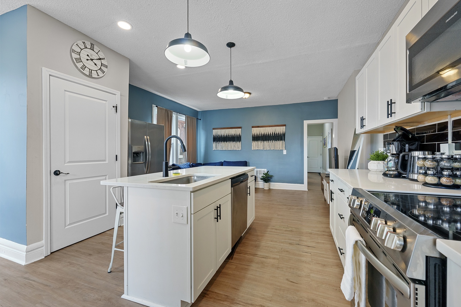 Prepare culinary masterpieces in Apartment 1166.5’s stylish open kitchen