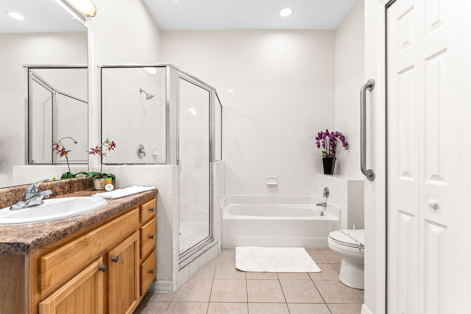 Shared bathroom with separate tub & shower accessible from hallway & Bedroom 2