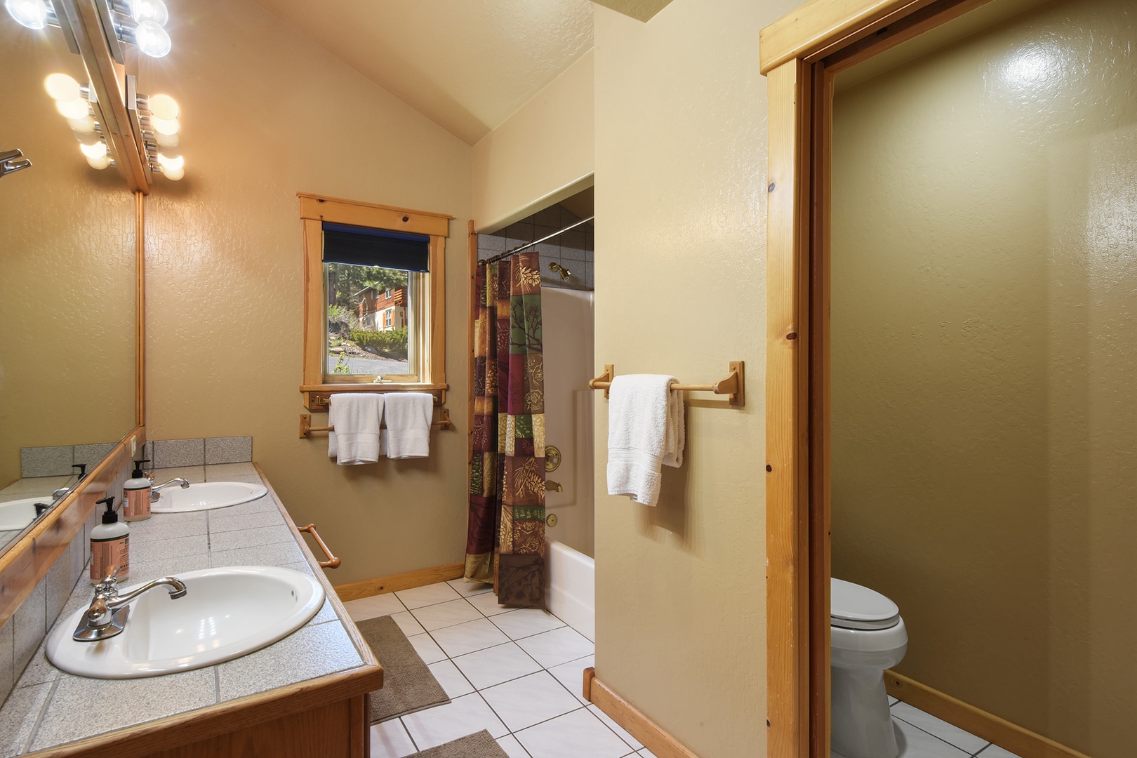 Full bathroom (2nd floor) offers double vanity and a shower/tub combo