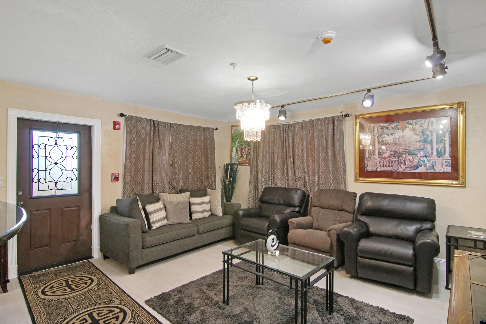 Cozy and spacious living area with ample seating for friends and family