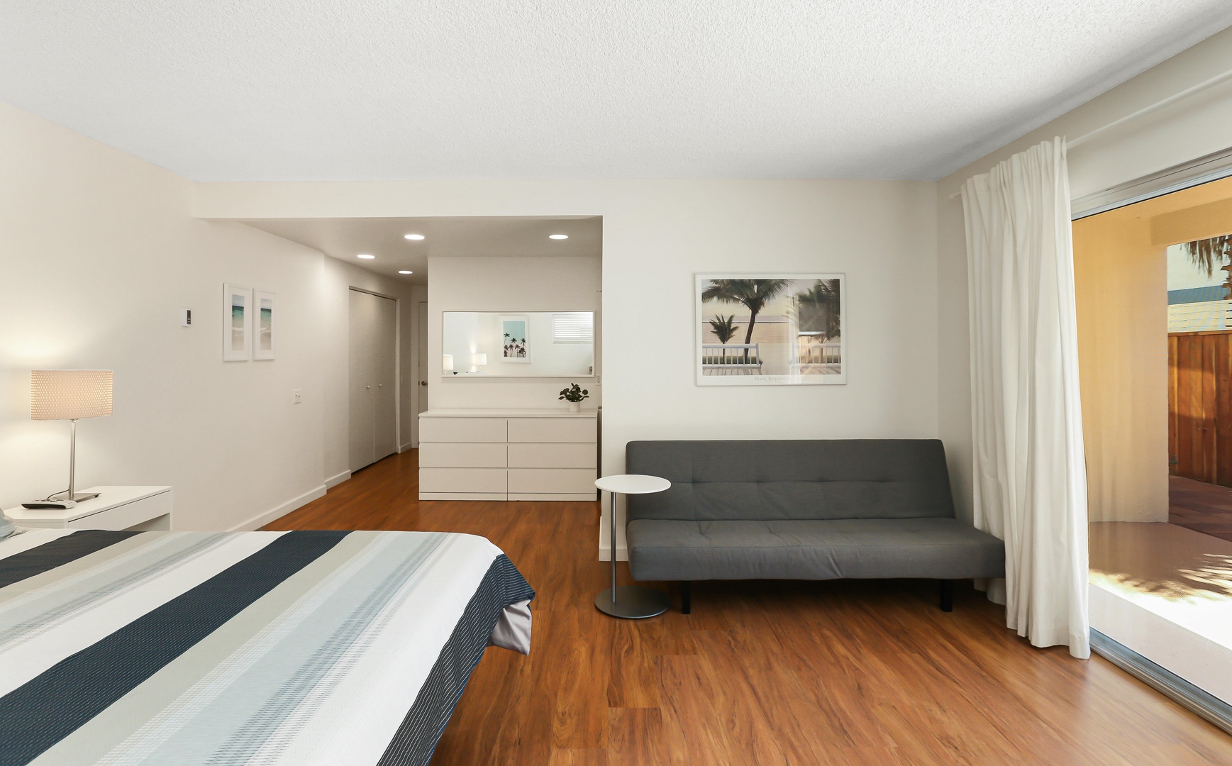 Bedroom 3 with King bed, TV, patio, and en suite (1st floor)