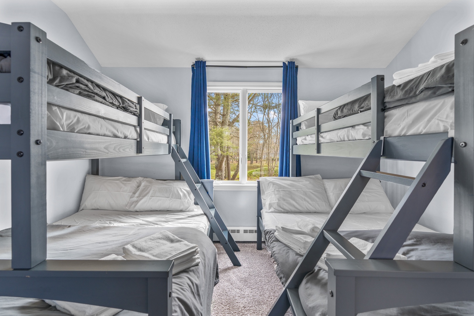 The final 2nd floor bedroom offers a kids’ area & a pair of twin-over-full bunkbeds