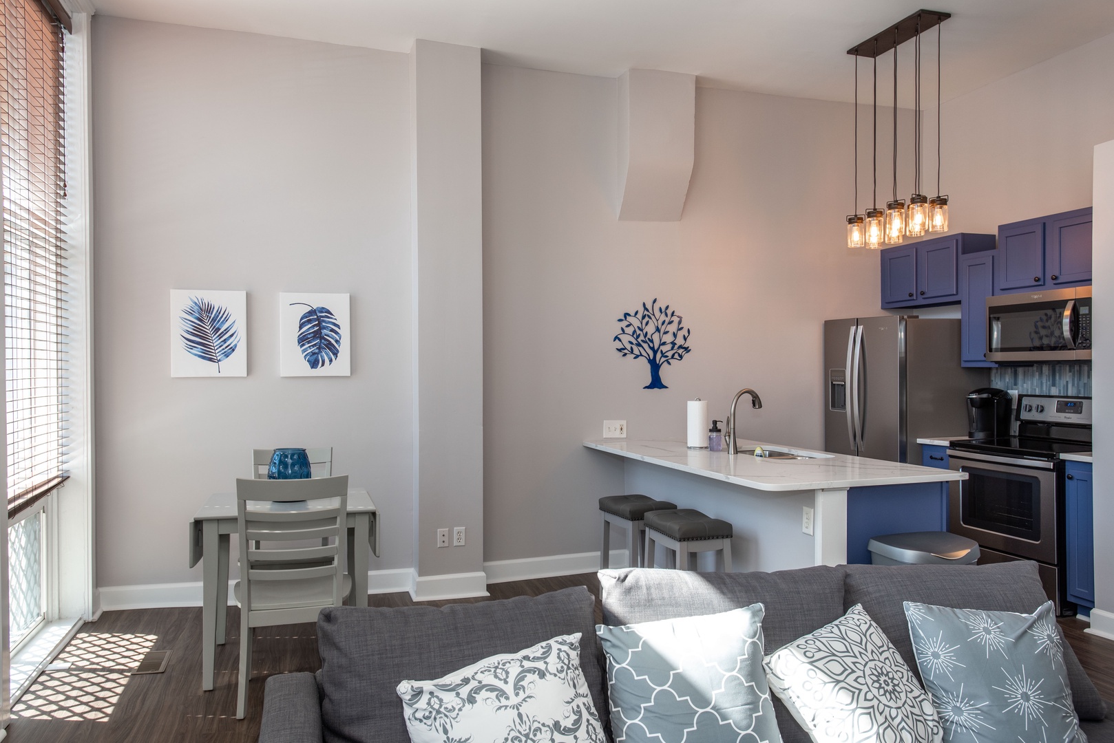 Apt 1 – Enjoy the open, breezy layout of the main living/dining/kitchen space