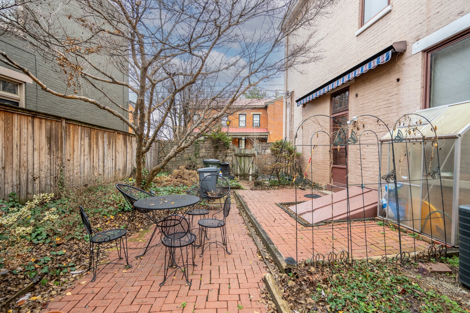 Lounge the day away or dine alfresco on the charming brick patio