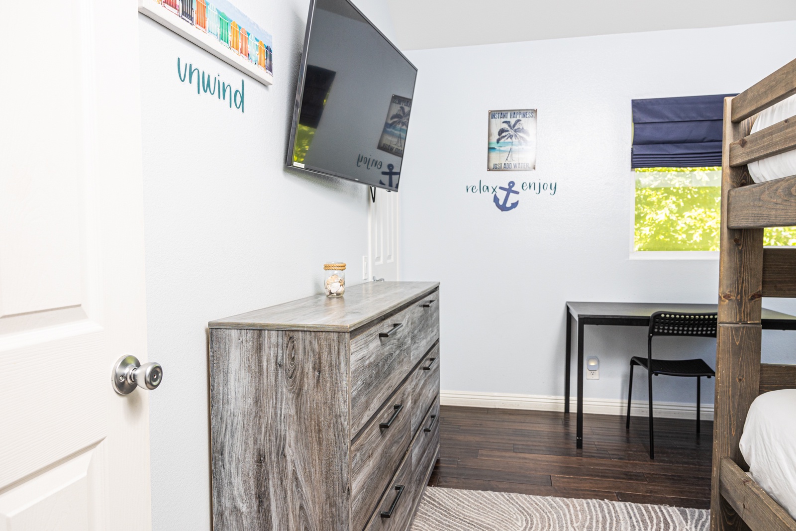 Recharge in the final bedroom, offering a full-sized bunk beds