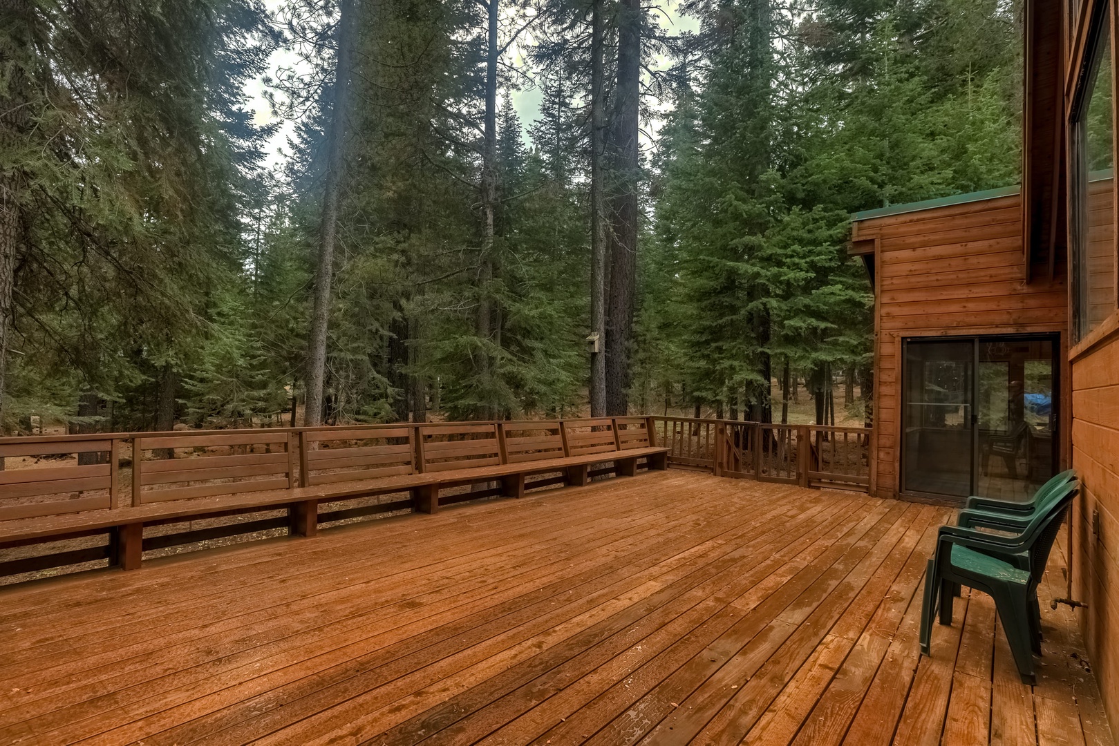 Spacious deck with forest view
