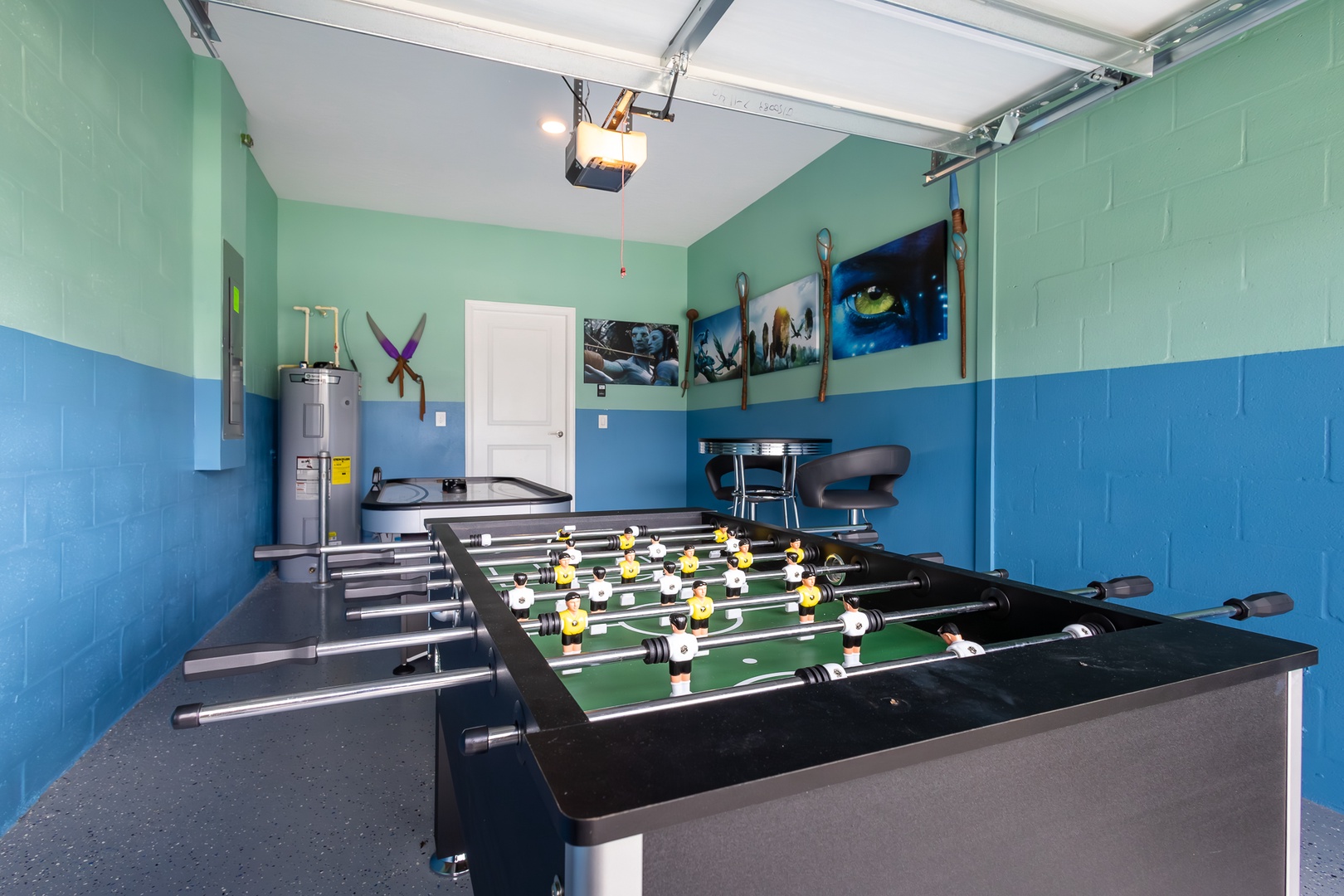 Unleash your competitive side in the garage-conversion game room!