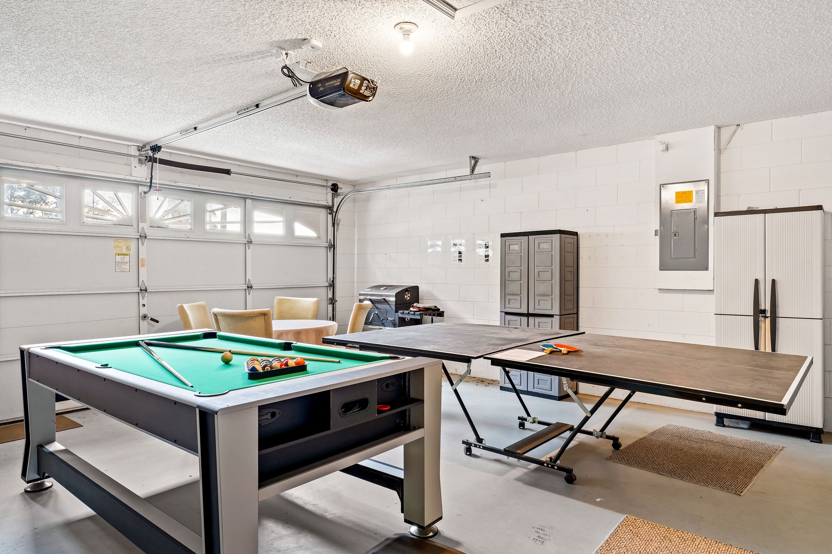 Game night haven: Pool table, air hockey, ping pong & seating for 4