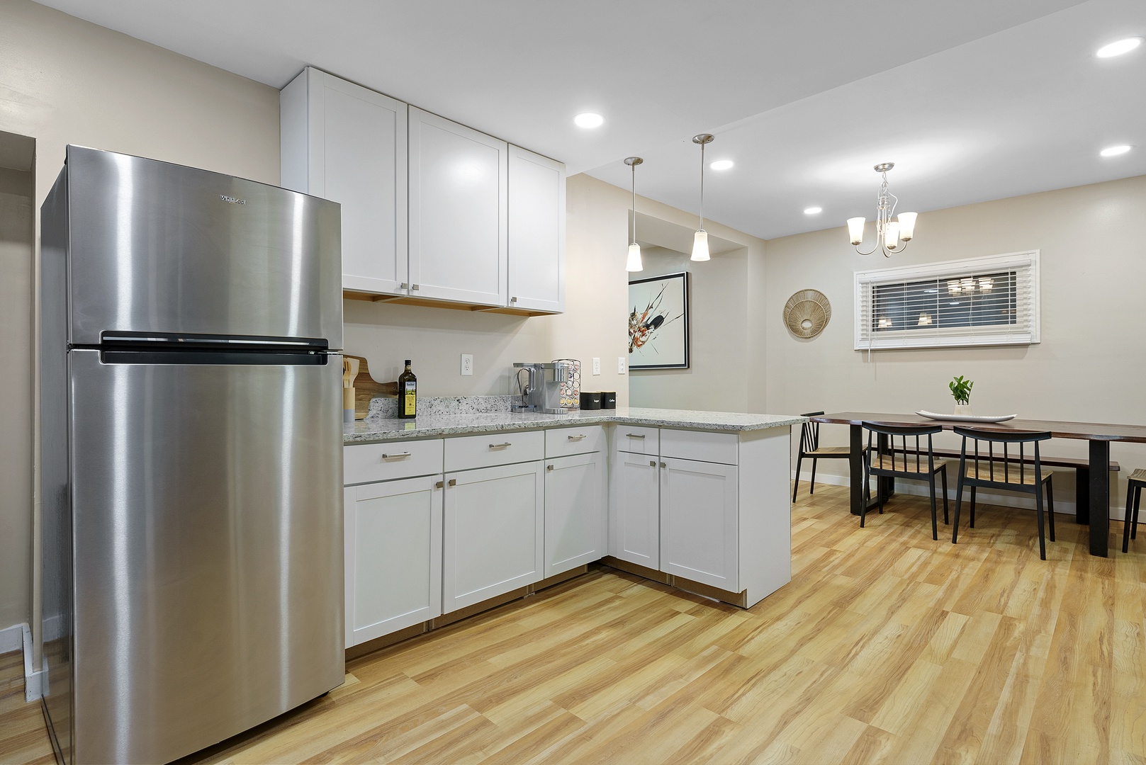 The open, airy kitchen offers ample space & all the comforts of home