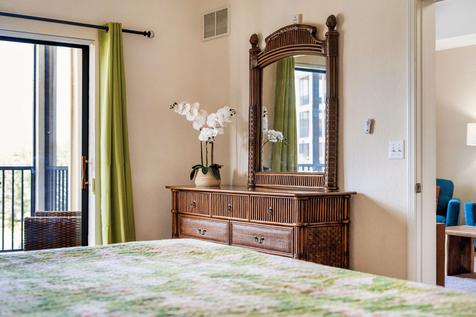 Bedroom 2 with queen bed, TV, and ensuite