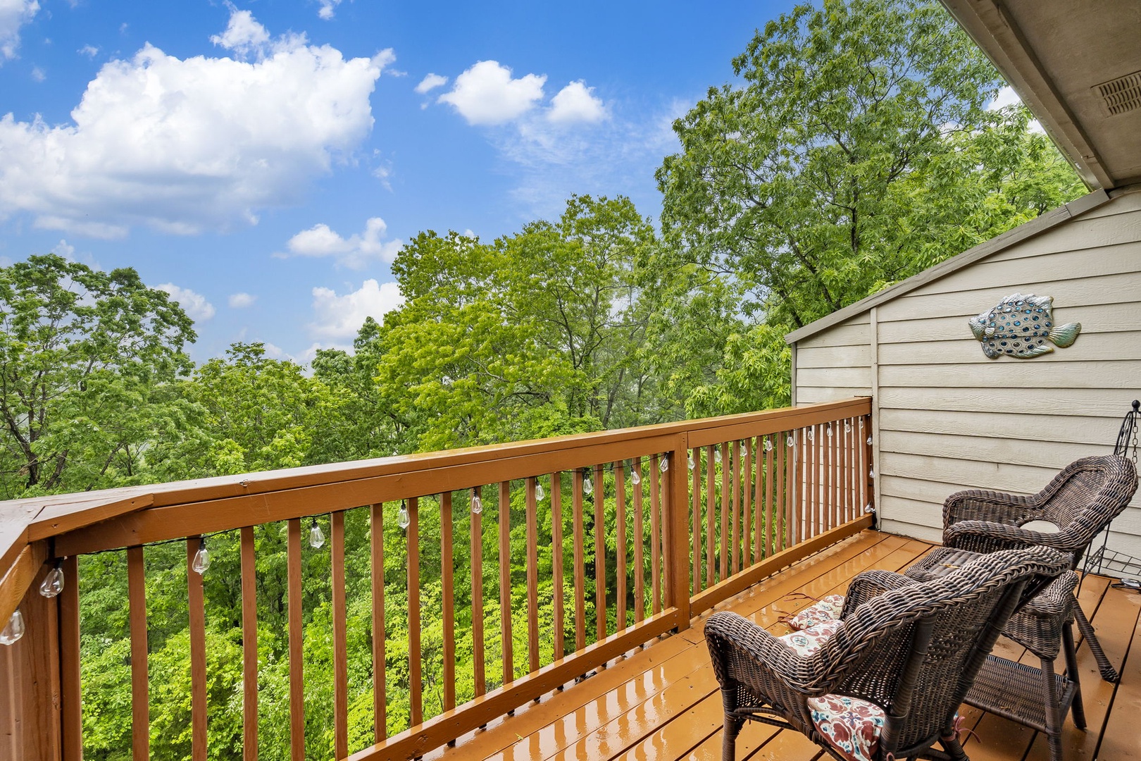 Enjoy tranquil treetop views from your very own private deck