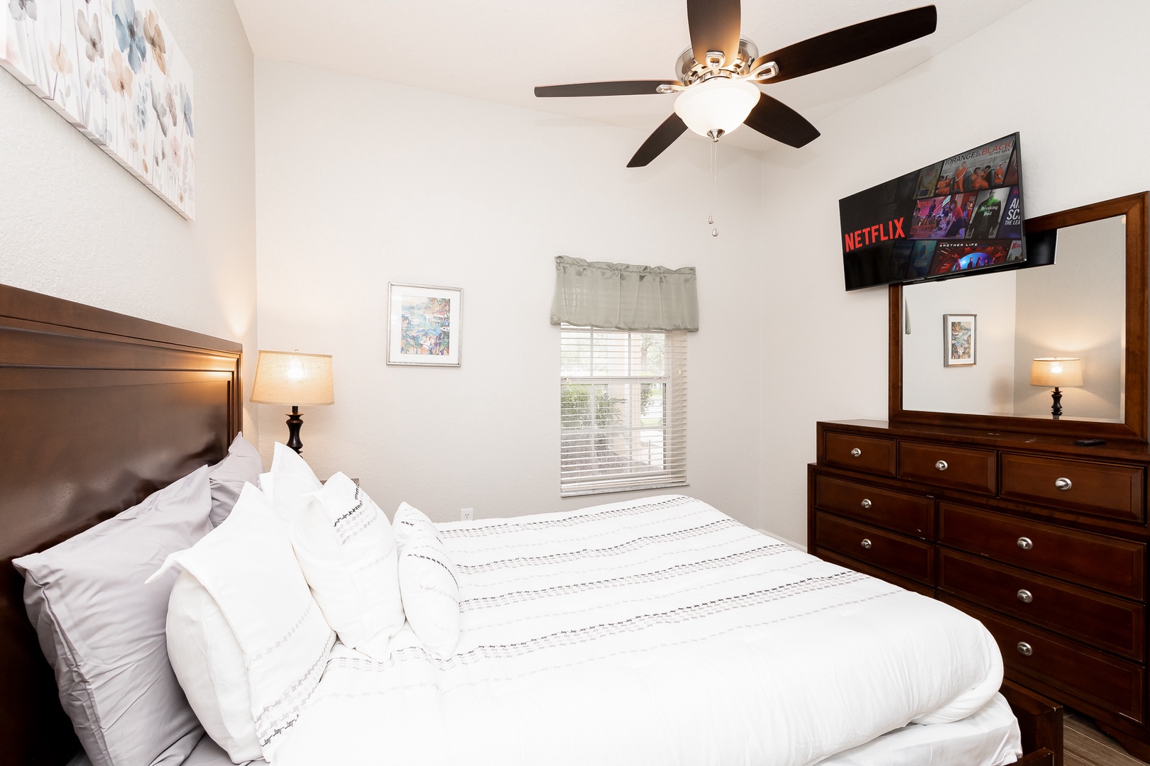 Bedroom 1 with queen bed and Smart TV