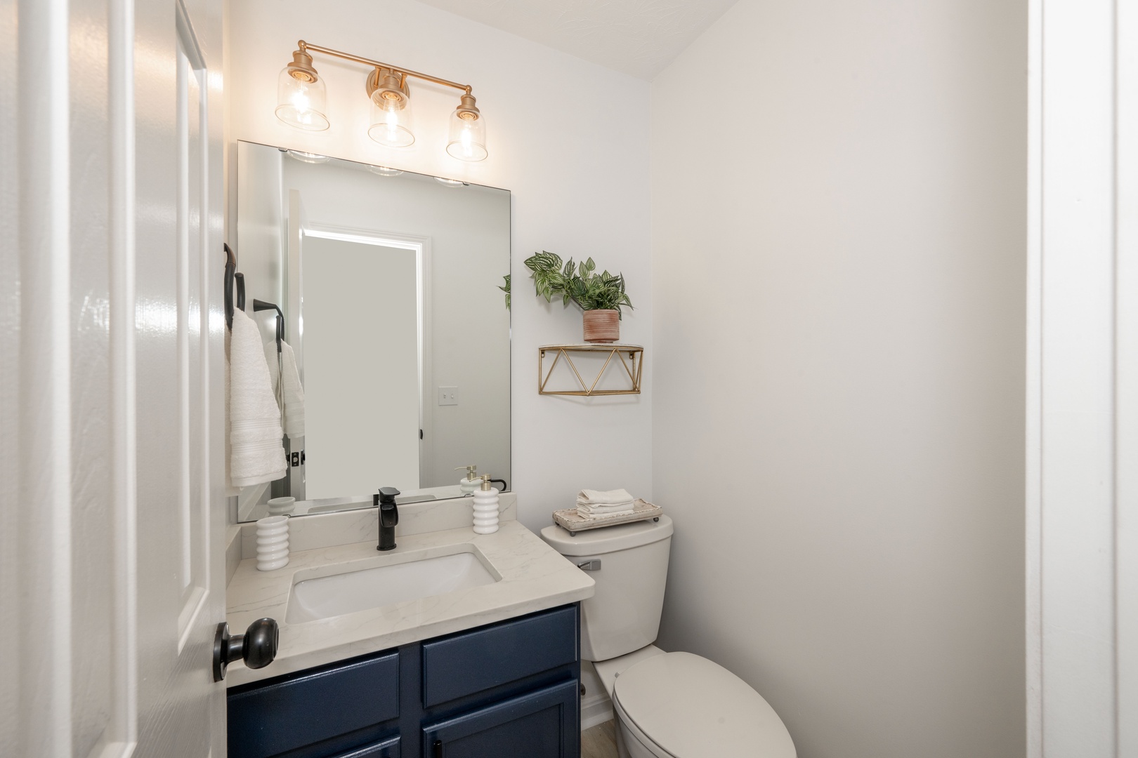 This half bathroom contains a single vanity