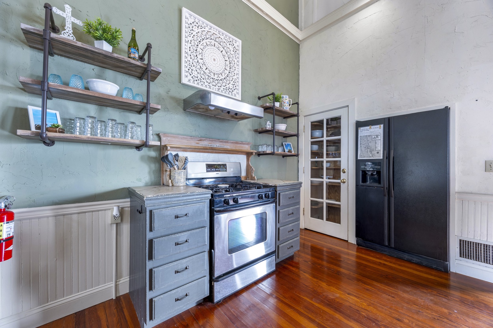 The open, airy kitchen offers ample space & every home comfort