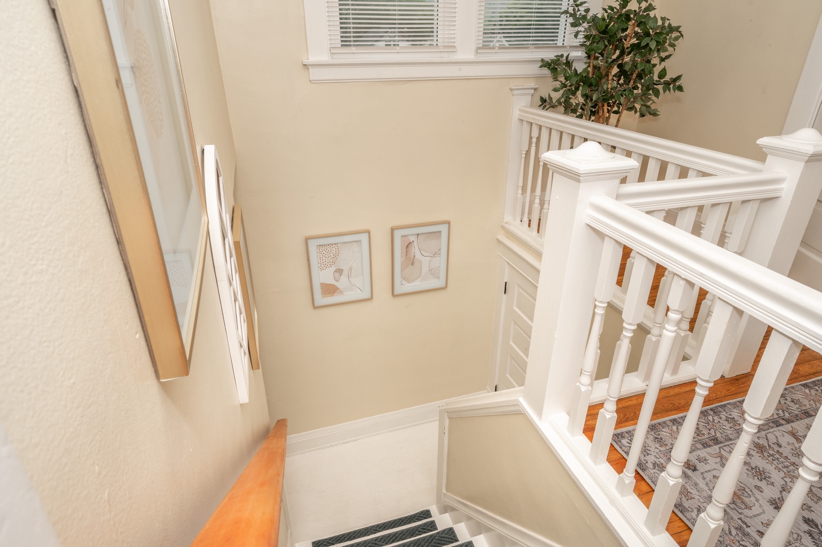 This home’s historic charm continues even throughout the staircase