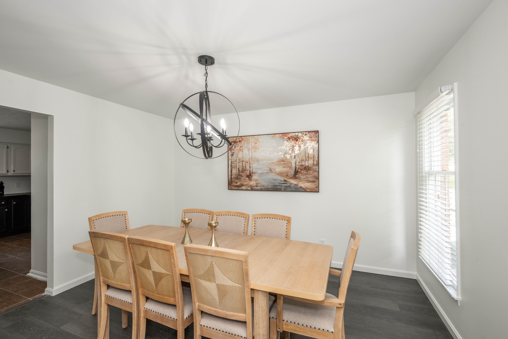 Formal dining area with table and seating for 8