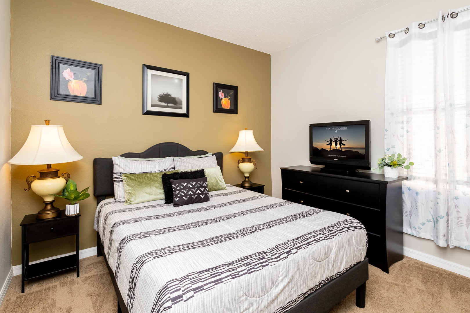 The final bedroom retreat offers a cozy queen bed & smart TV