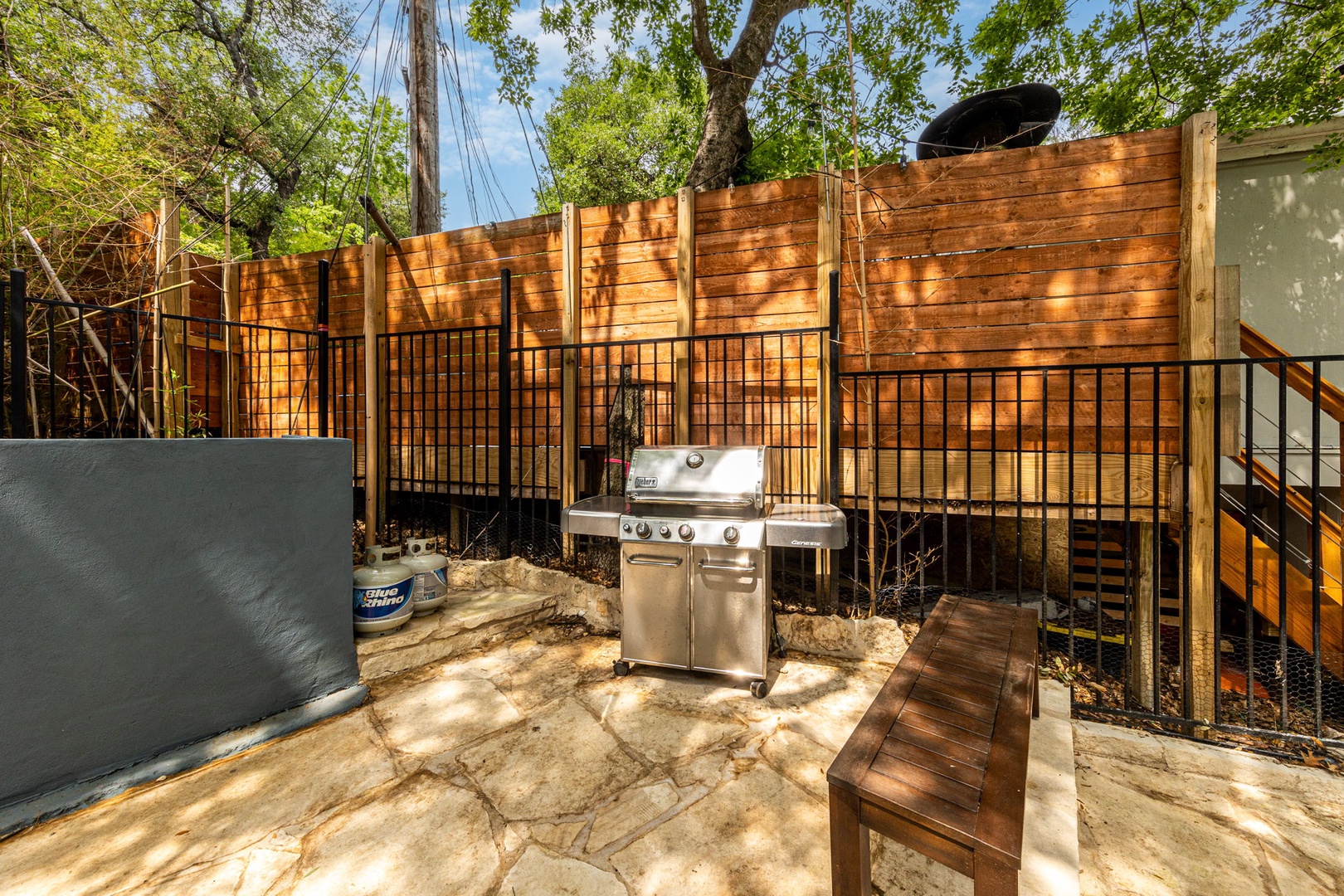 Unit B outdoor area equipped with gas grill