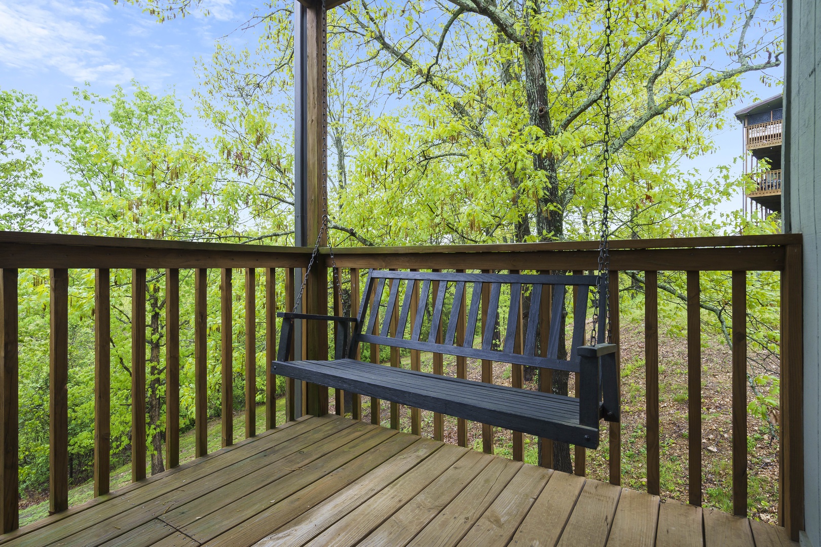 Panoramic view from the covered deck with swing and outdoor seating (unit 8)
