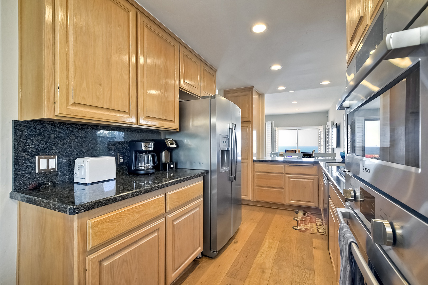 The updated kitchen is spacious & offers all the comforts of home