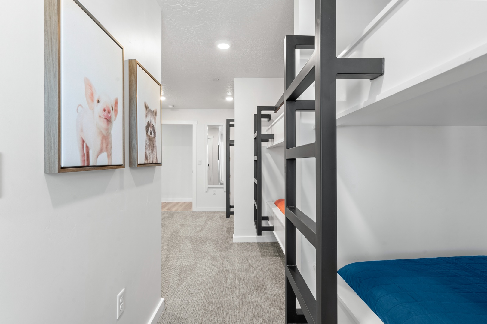 The 3rd-floor bunk suite, with full-over-full & twin bunks, ensuite, & smart TV