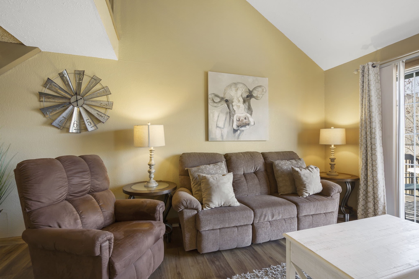 Cozy and spacious living area with TV