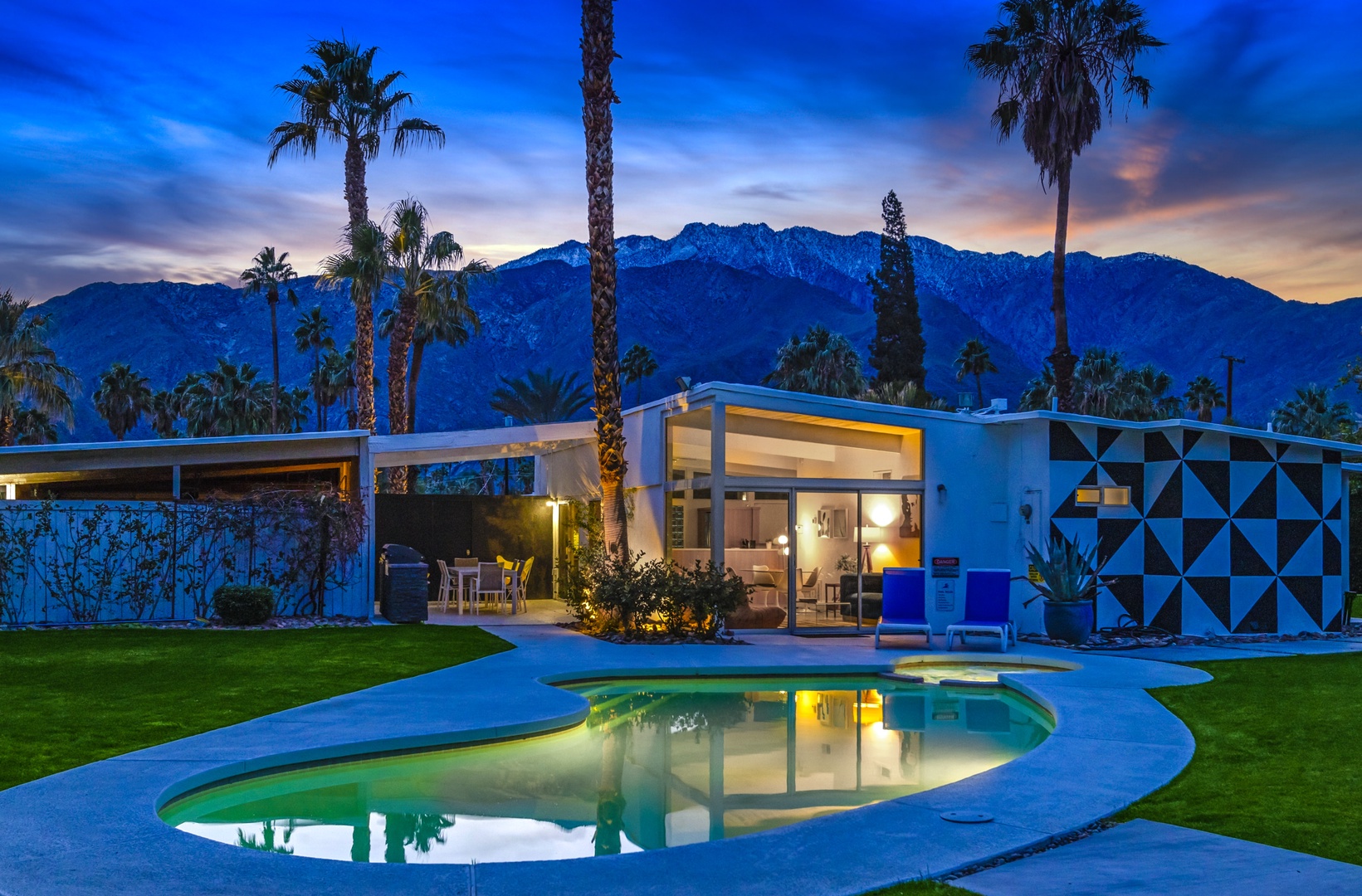 Pool and house at night