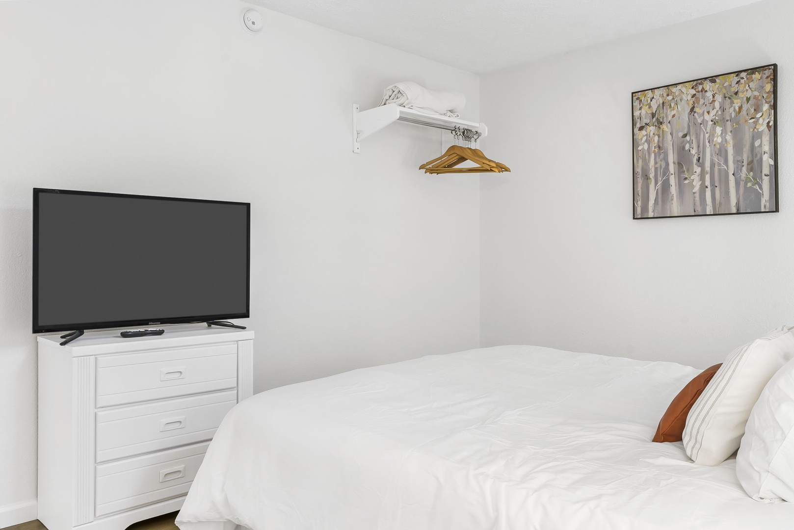 The final suite on the 2nd floor includes a king bed, Smart TV, & en suite
