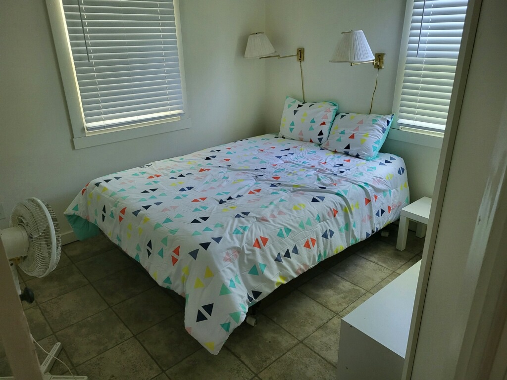 Queen bed in bedroom 1