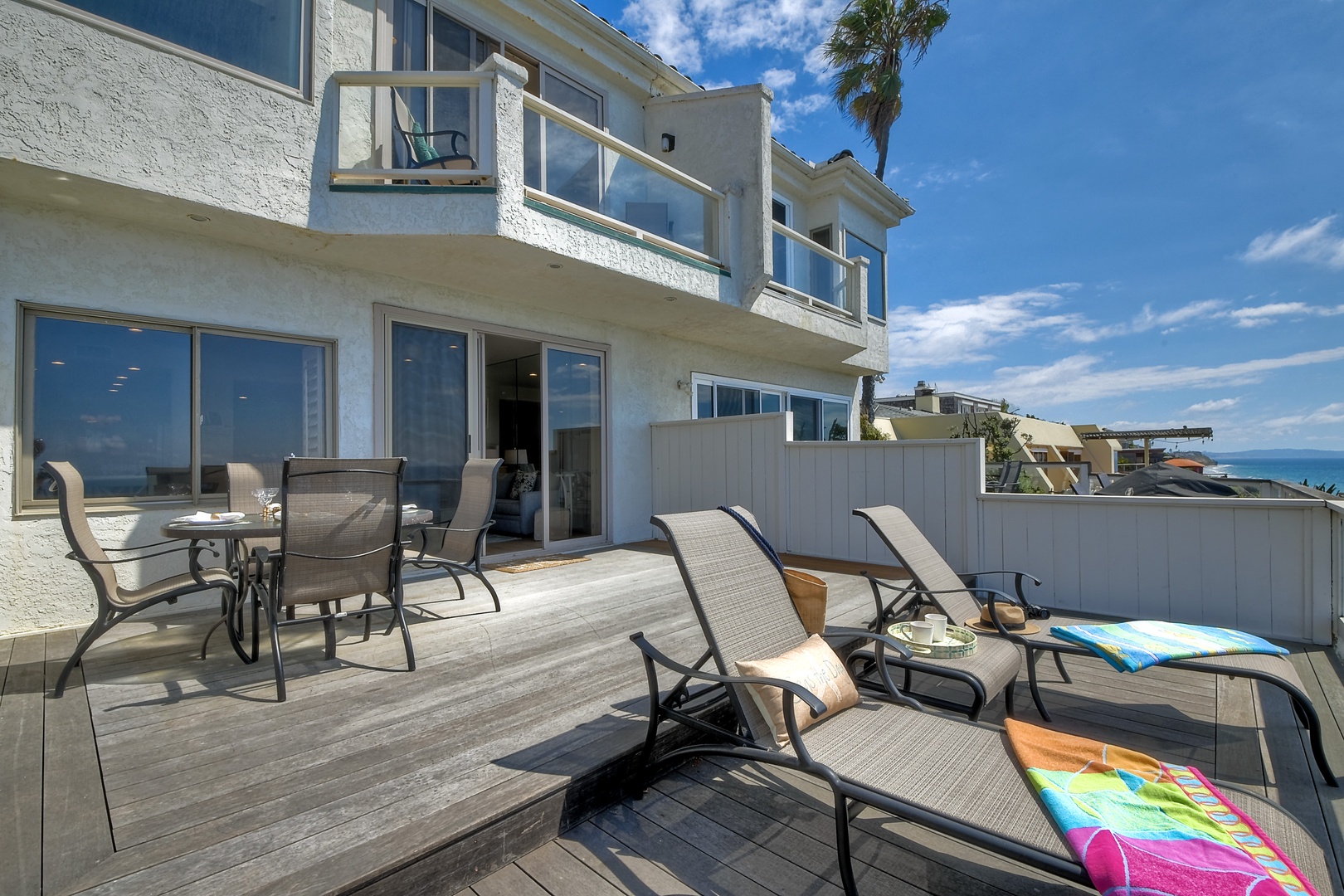 Lounge the day away or dine alfresco with ocean views on the deck