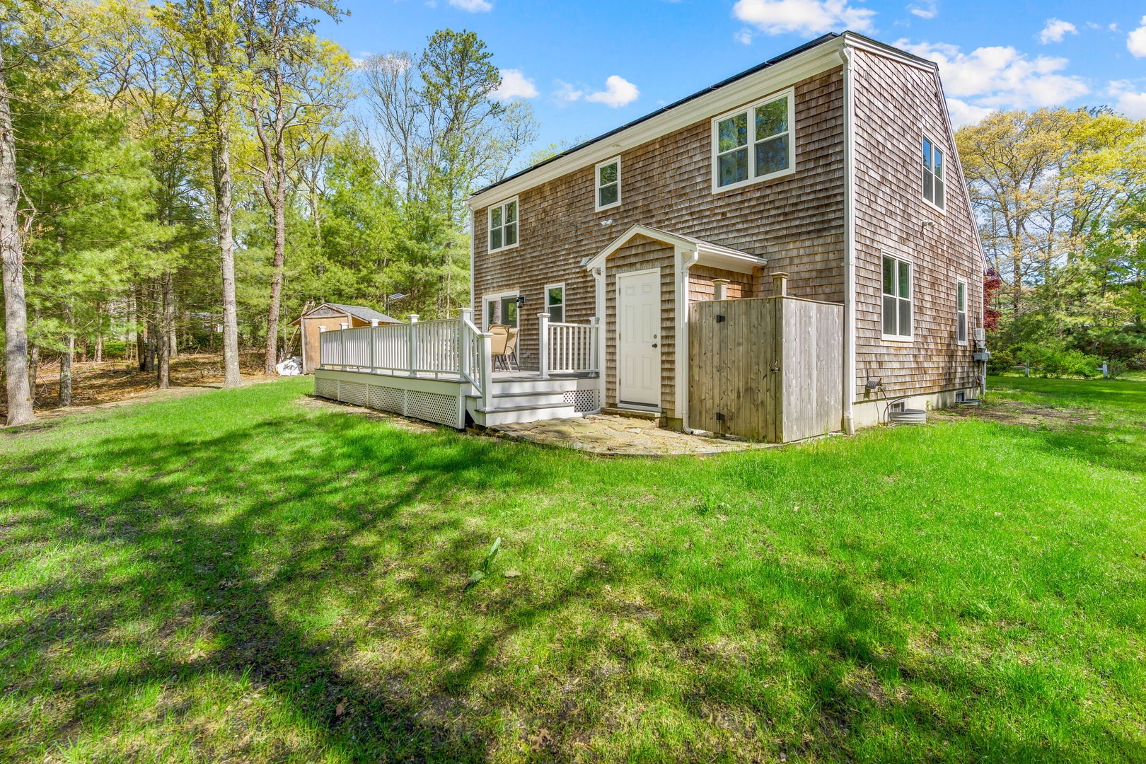 The large back yard offers plenty of space for relaxation & play