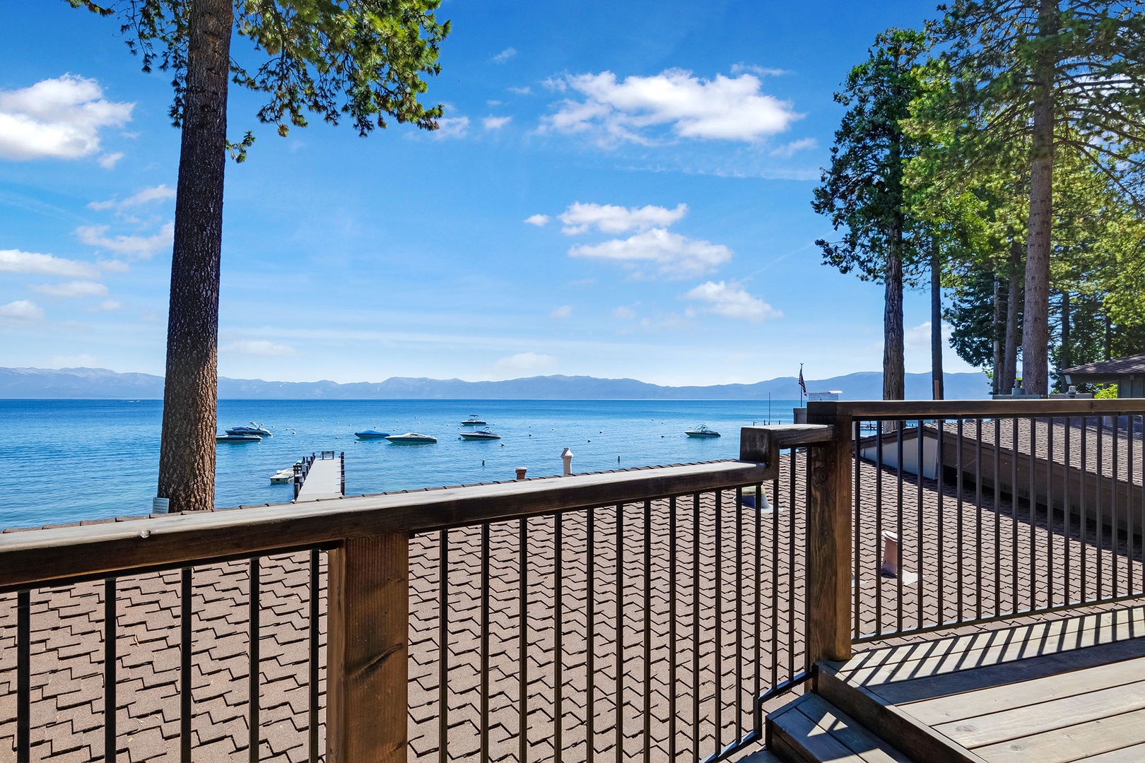 Lounge chairs and outdoor dining in the balcony