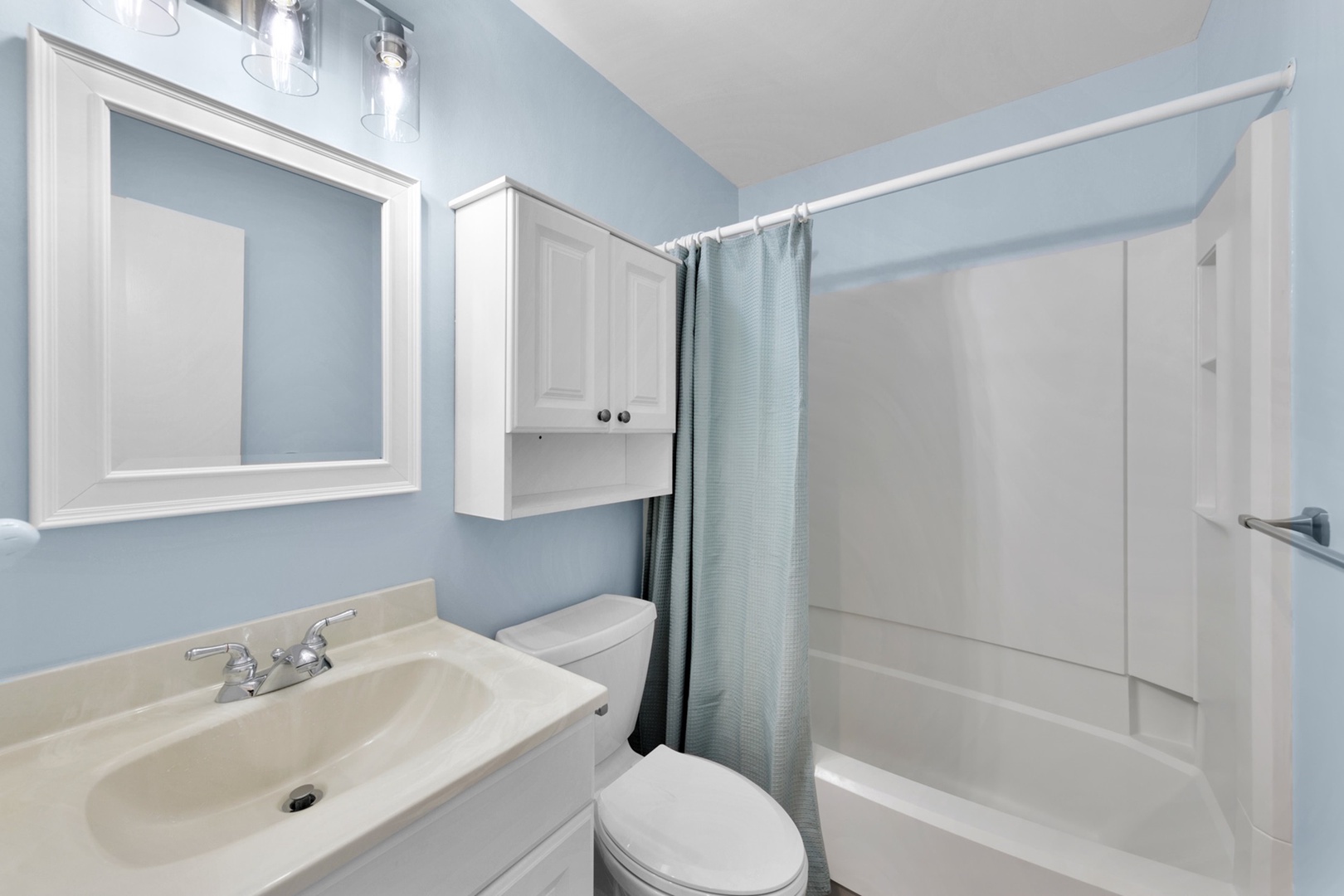 The second full bathroom offers a single vanity & shower/tub combo
