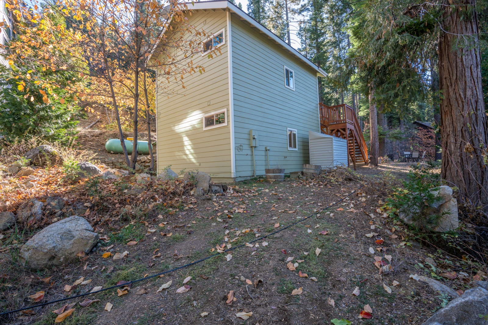Take in the fresh air & wilderness views in the secluded yard area