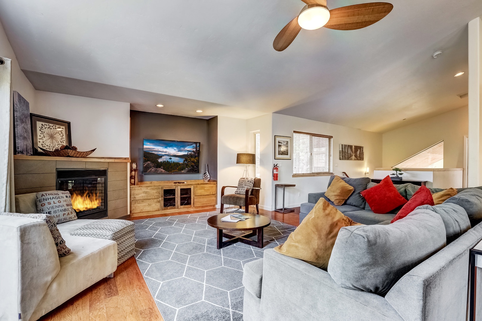 Cozy living room with fireplace, TV, DVD player
