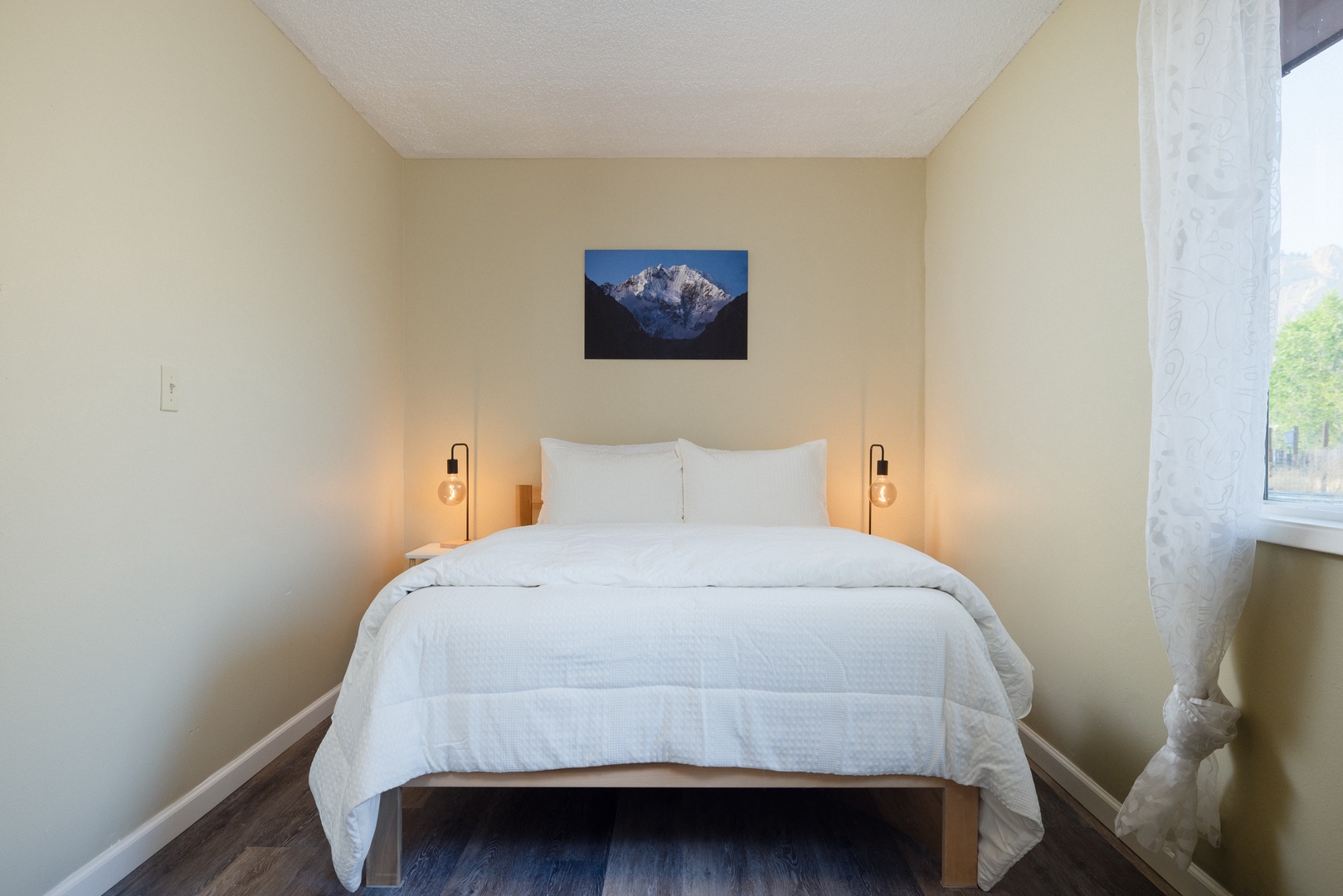 Recharge in the second bedroom retreat, offering a plush full-sized bed