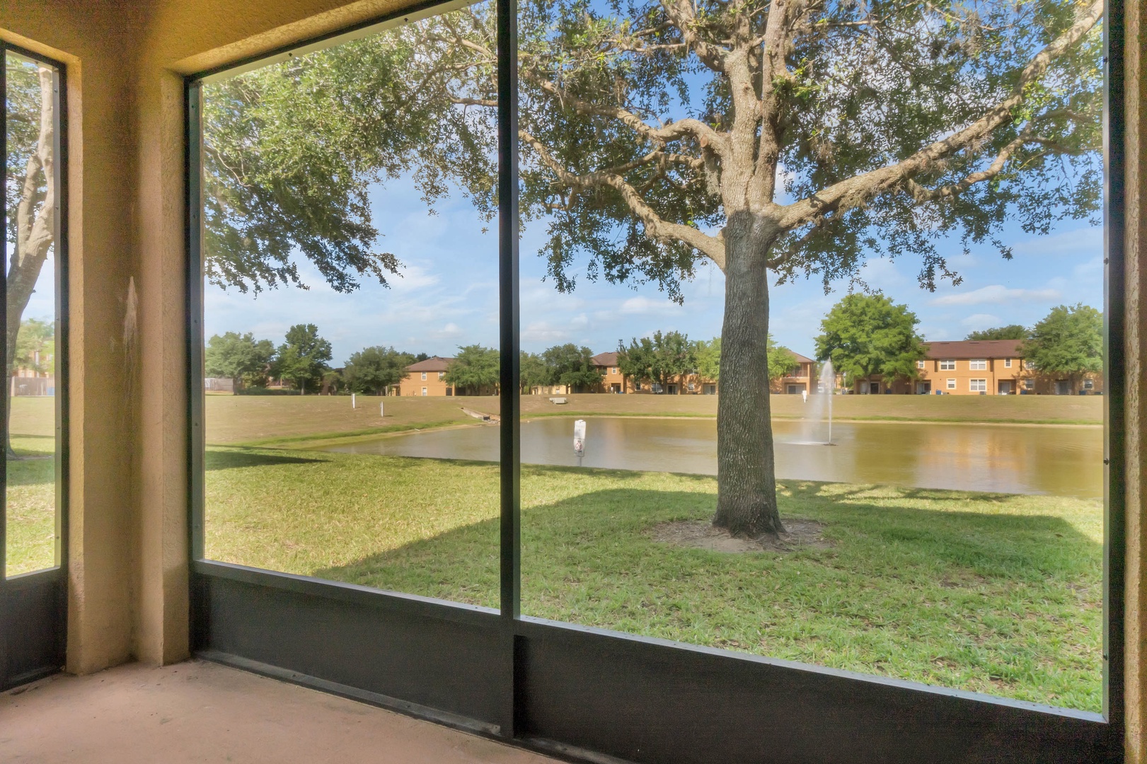 Screened patio with fountain view
