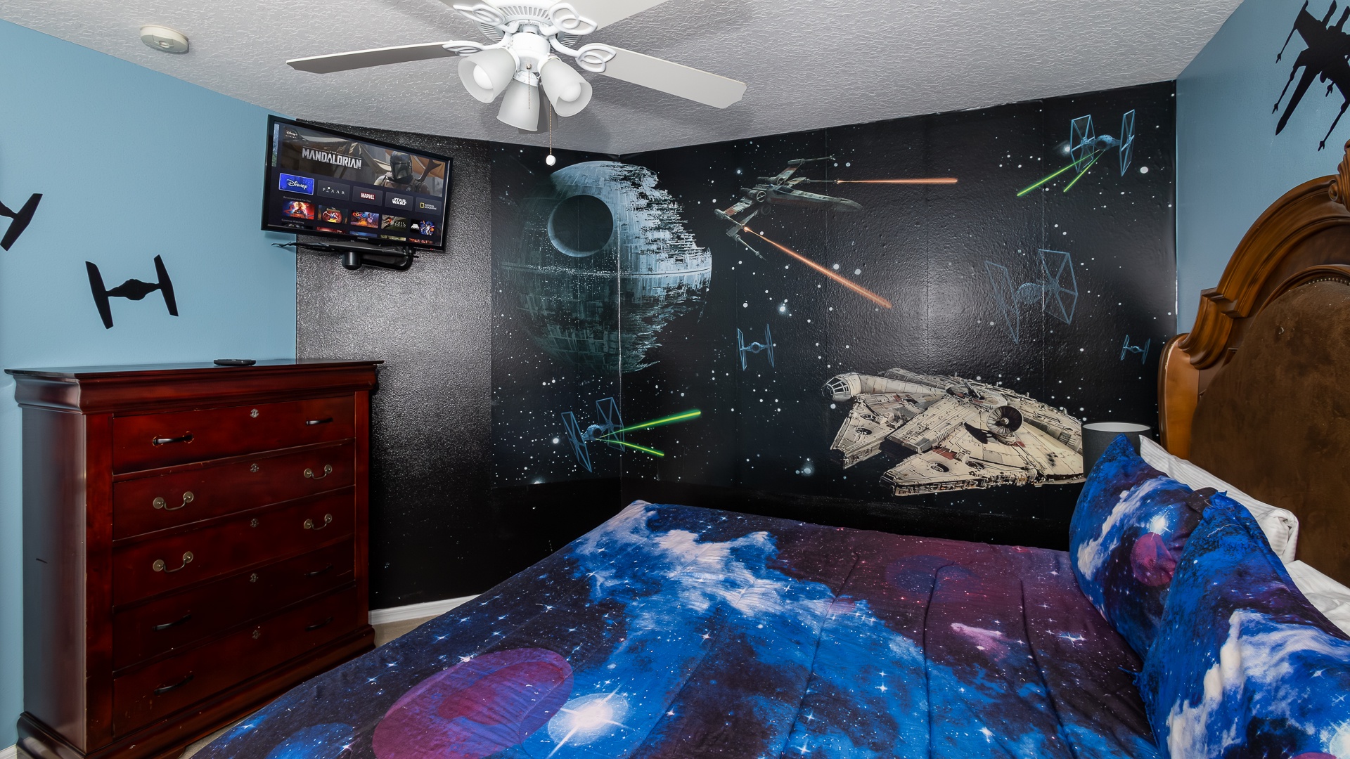 Second-floor Star Wars-themed king bedroom—galactic comfort awaits