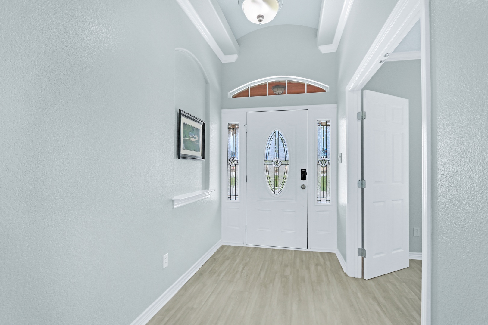 A bright, breezy entryway will welcome you home