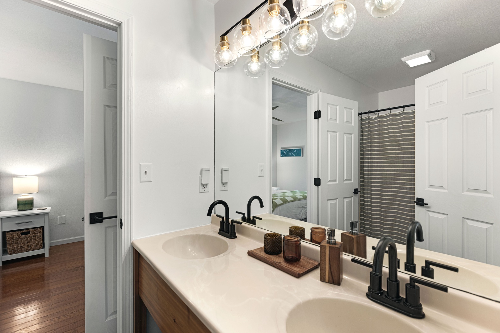 The Jack & Jill bath on the 2nd floor includes dual vanities and a shower/tub combo