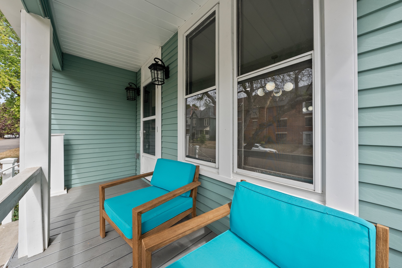 Sip morning coffee or an evening cocktail on the serene front porch