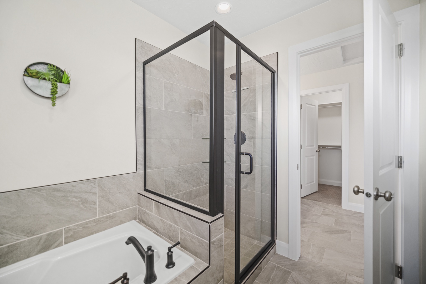 Ensuite bathroom with separate shower and tub