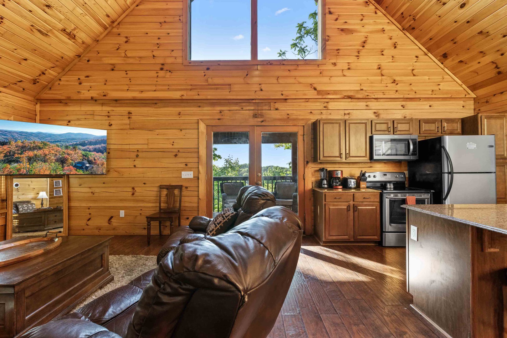 Living area with ample seating, Smart TV, and fireplace