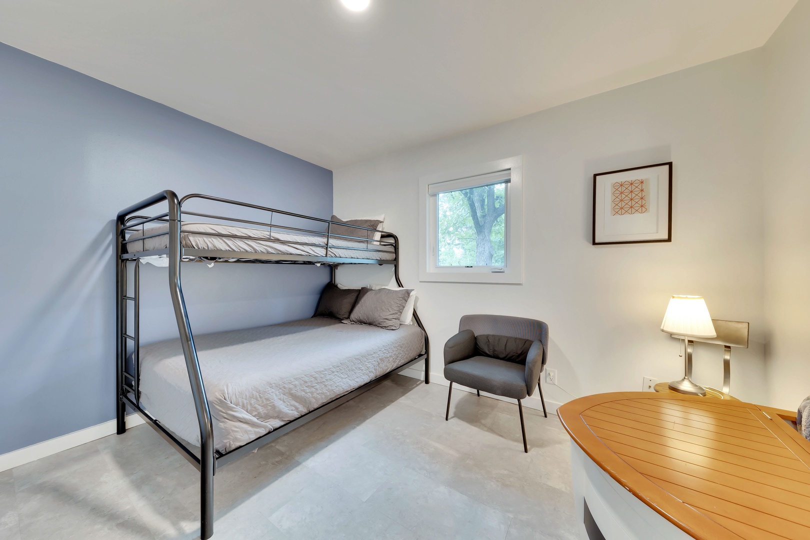The 4th bedroom offers a queen bed & twin-over-full bunks