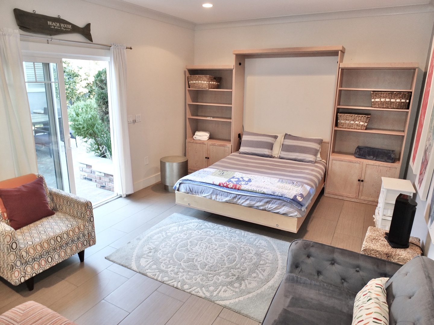 The casita provides a full-sized murphy bed, living area & smart tv