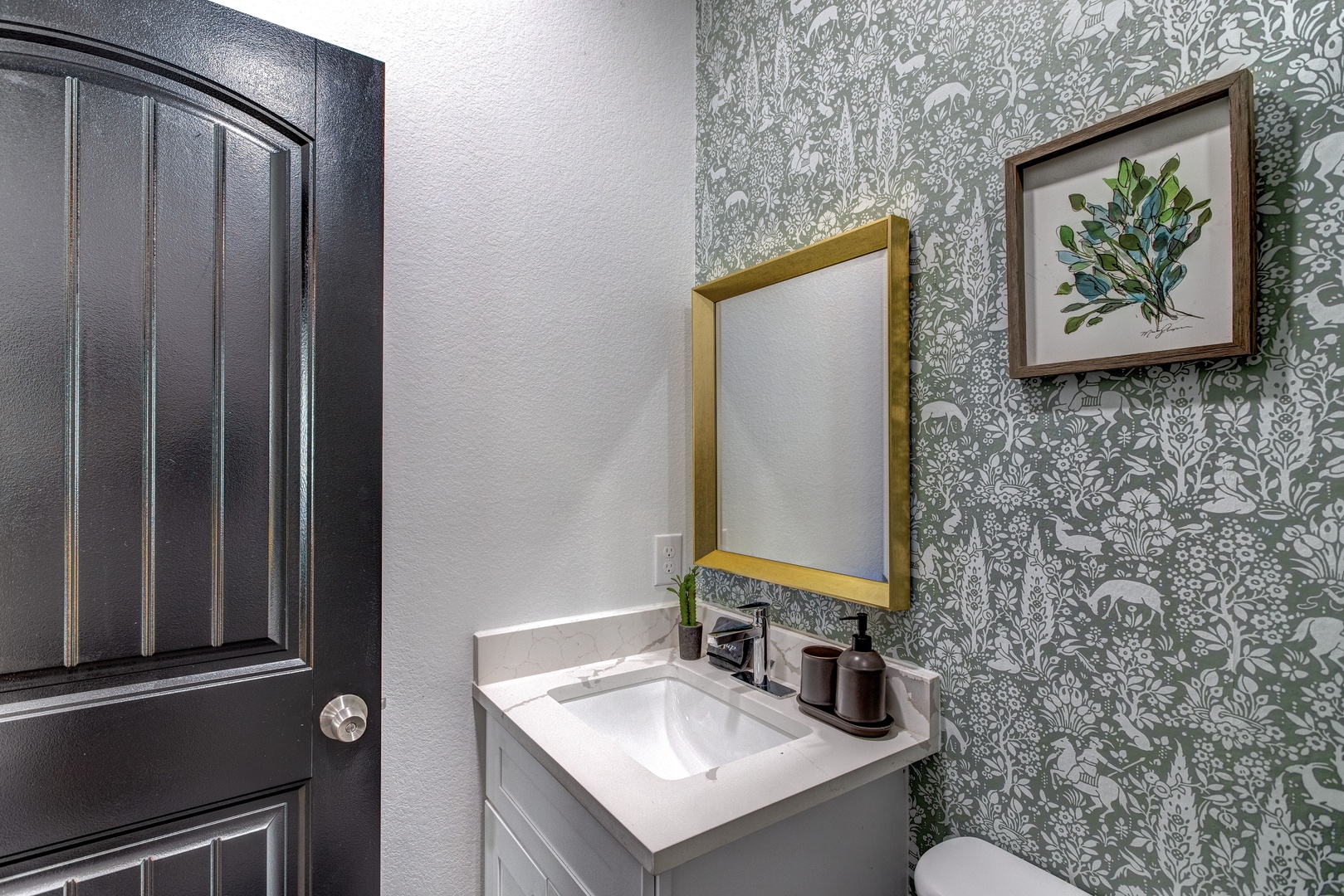 A single vanity & shower await in this ensuite bathroom