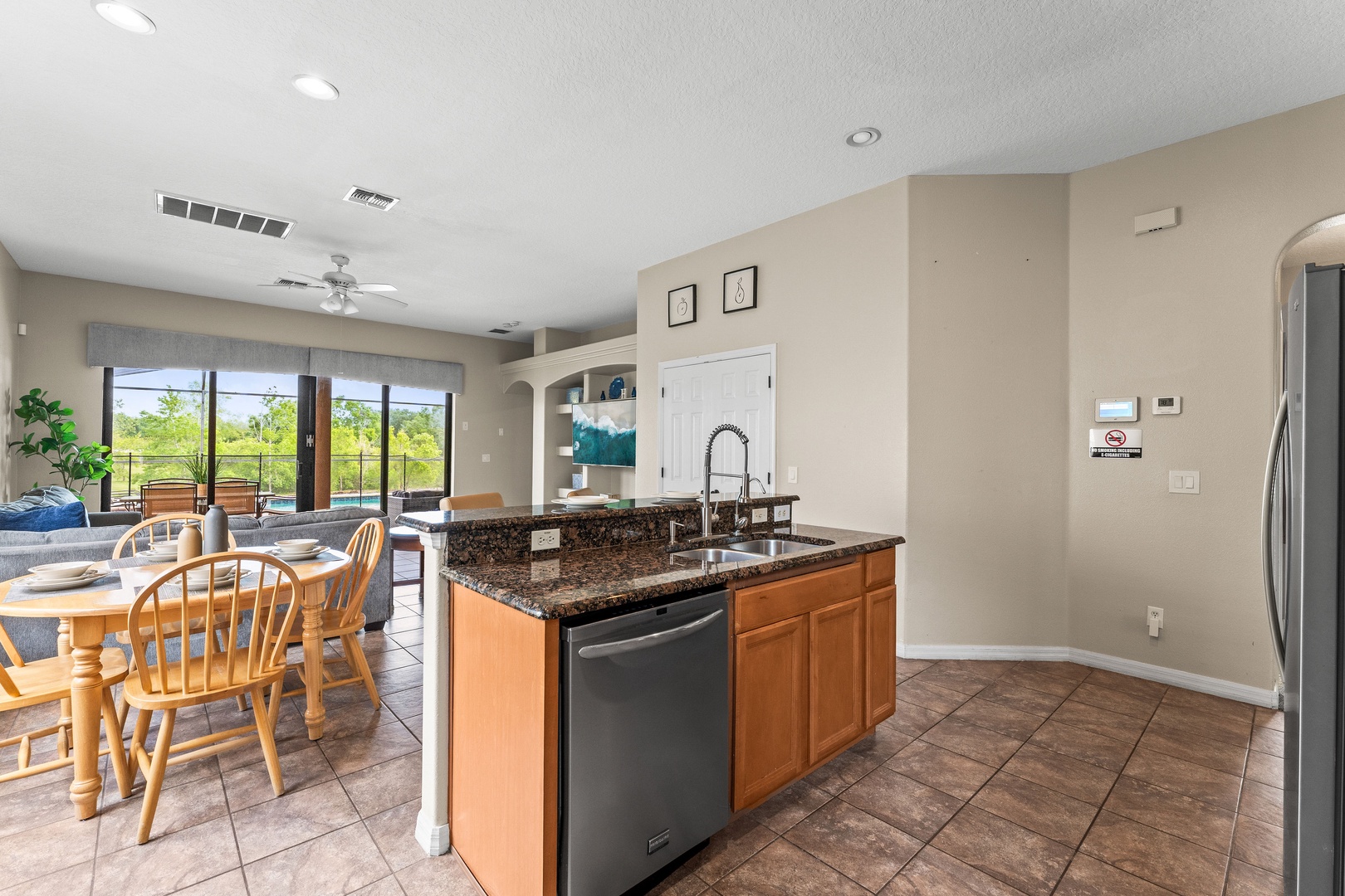 The open, airy kitchen offers ample space & every home comfort